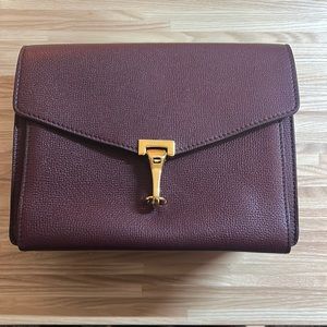 Authentic Burberry purse with adjustable strap.